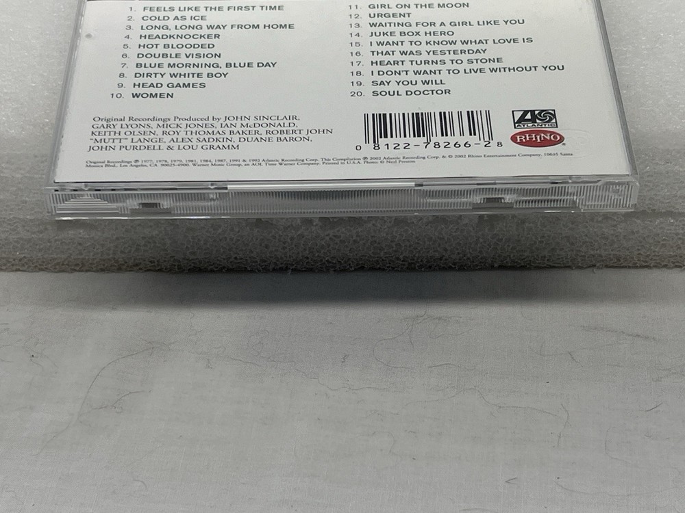Mick Jones Signed Autograph Foreigner CD Complete Greatest Hits