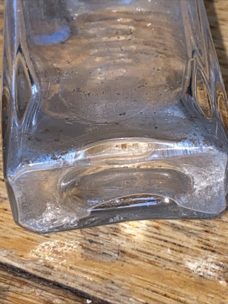 E. RIMMEL' colourless glass perfume bottle