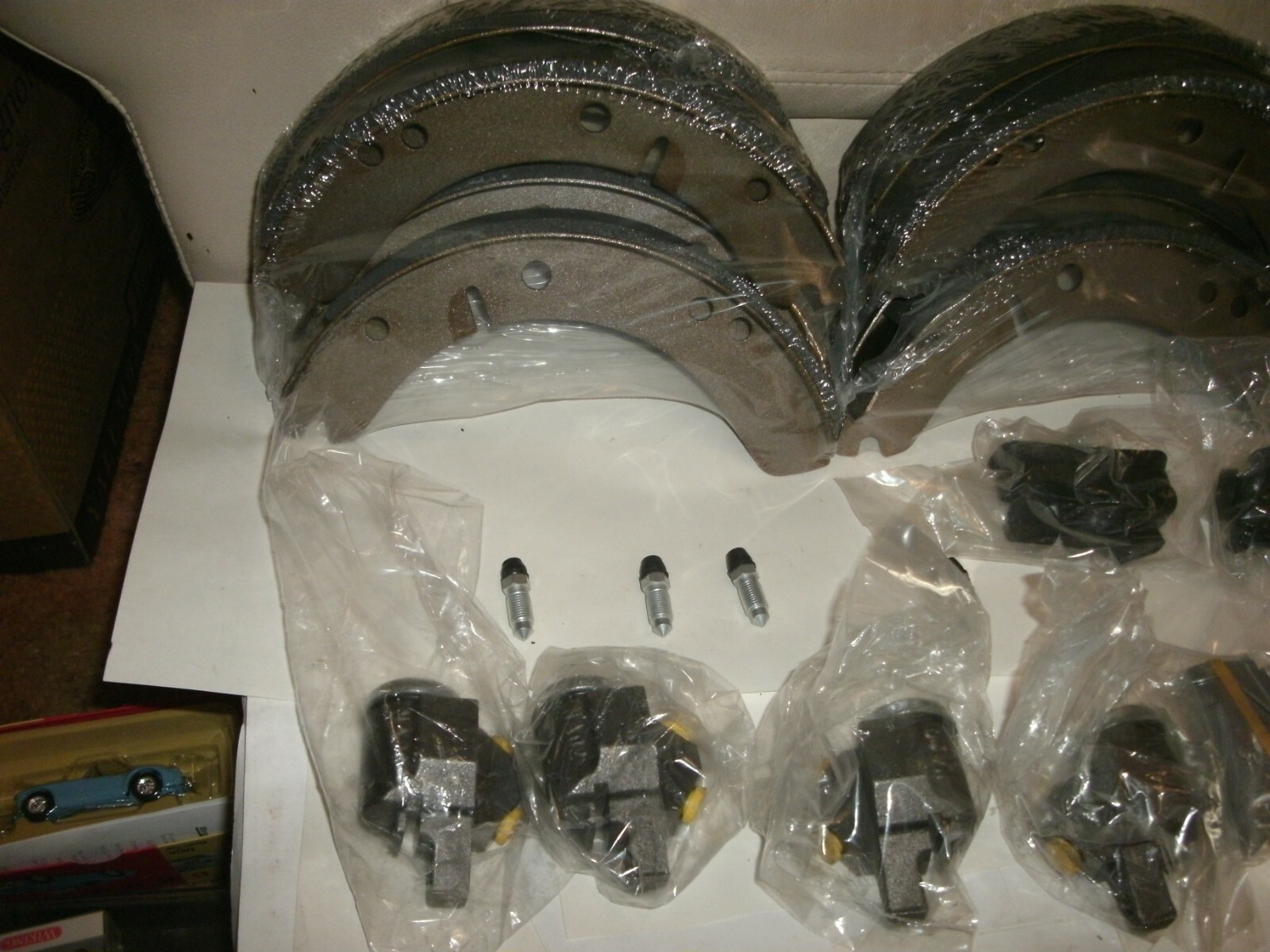 MGA NEW FRONT AND REAR BRAKE SHOES , 2 SETS AND 6 WHEEL CYLINDERS , 4 FT 2 REAR