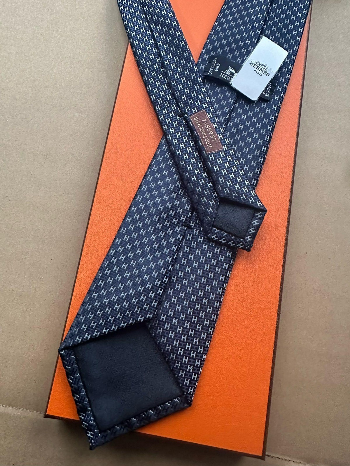 HERMES BLUE SILK TIE -- ALL OVER H MONOGRAM JACQUARD