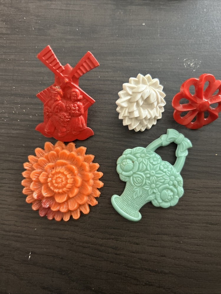Celluloid Pin And Plastic Pieces Lot