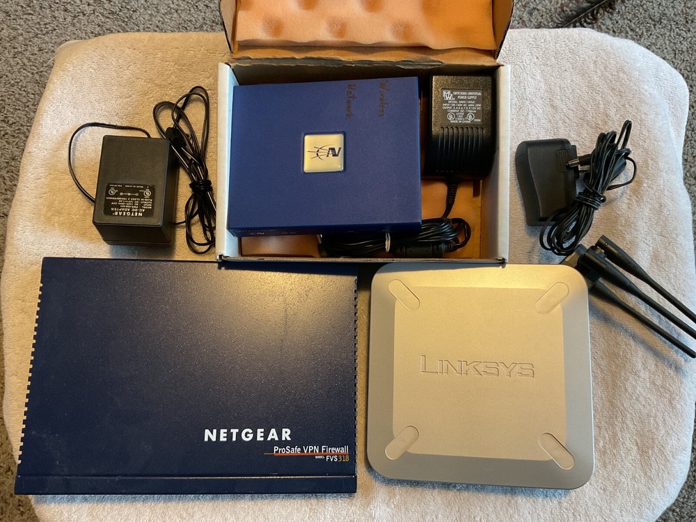 Misc. Older Routers Linksys, Netgear and Netscreen. 3 Total Routers