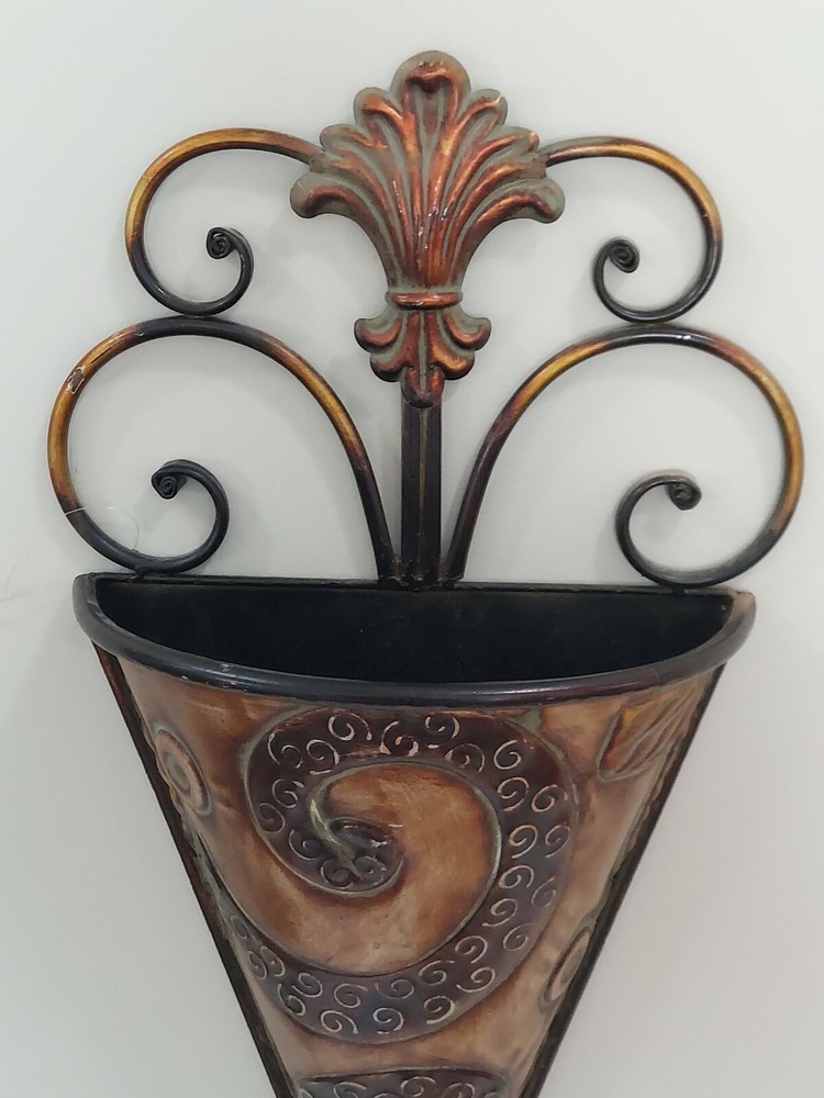 Large scroll work metal wall scone