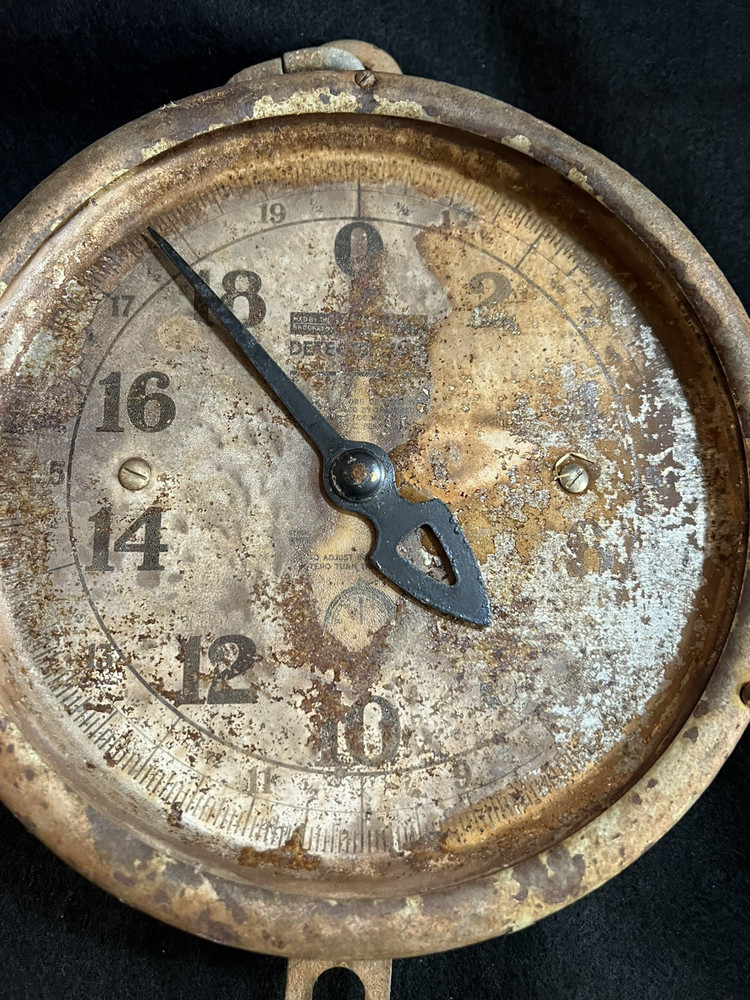 Antique rusty old hanging scale