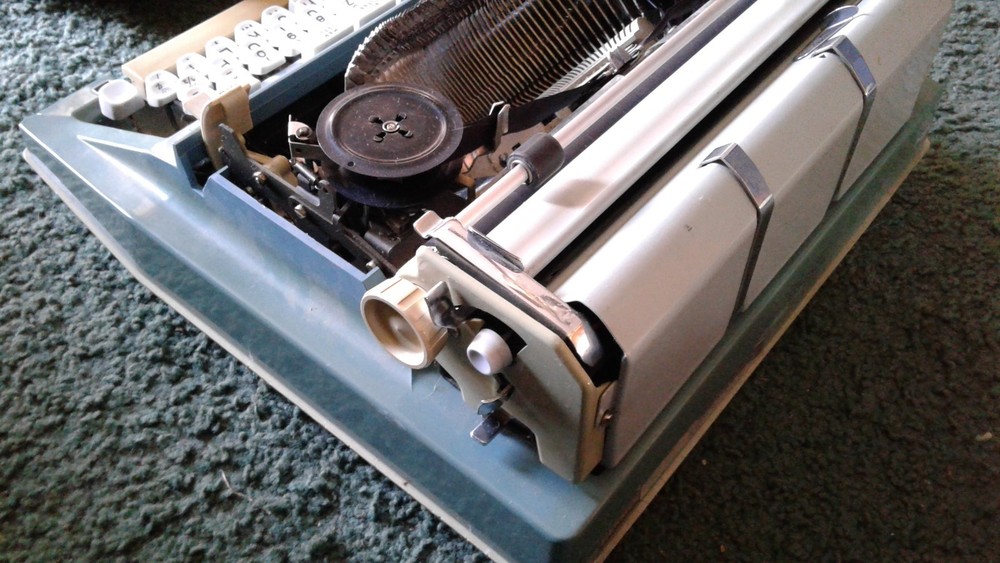 Hermes Typewriter with case and key