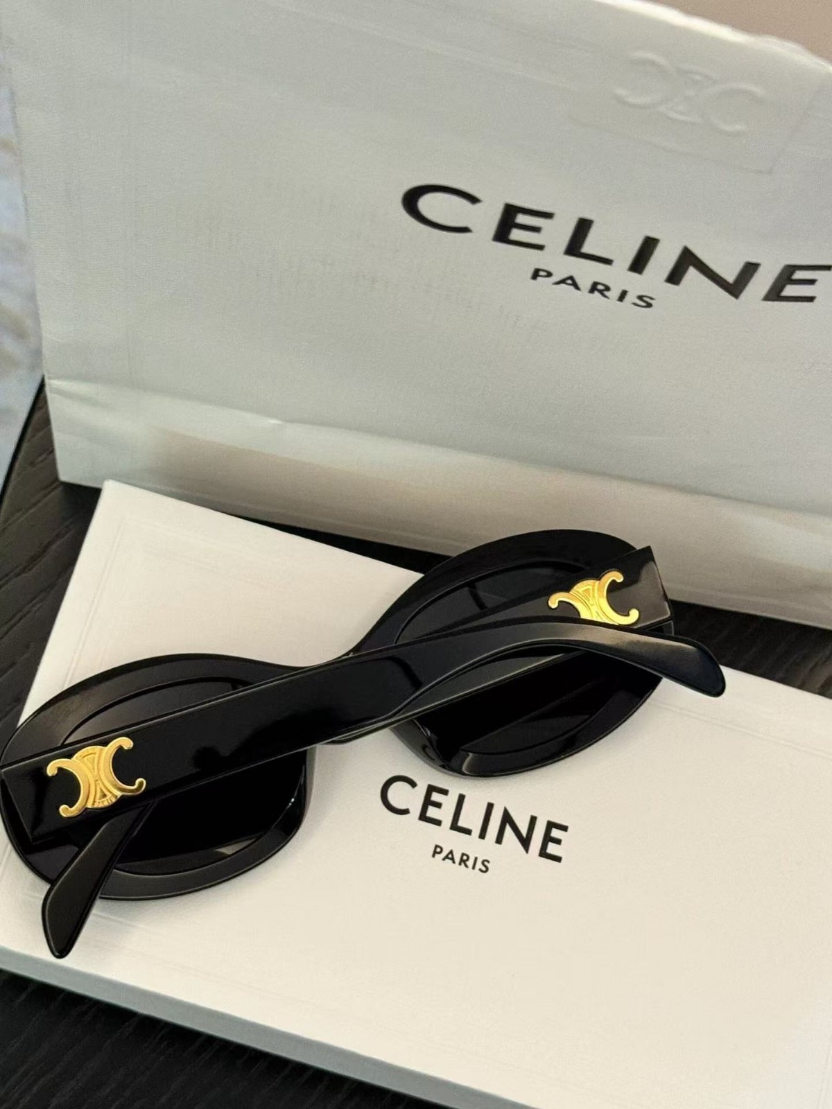 Celine CL40194U Triomphe Oval Sunglasses Black Frame Dark Grey Lens Women