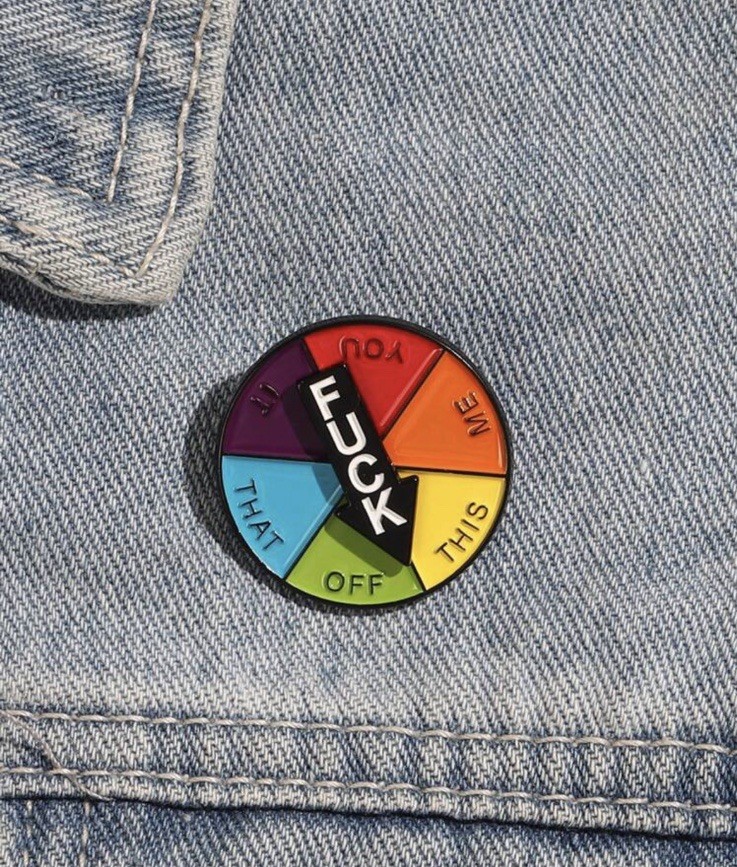 Funny Lapel Pin. Spinning Pointer.
