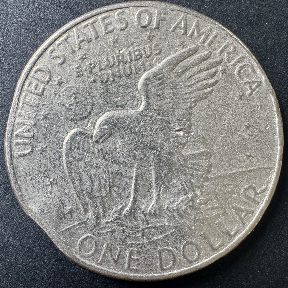 1972 EISENHOWER SOLLAR WITH ERROR. THREE CUDS