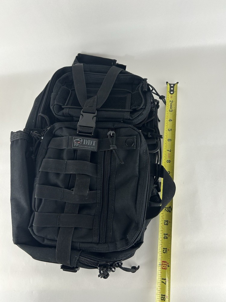 DDT Assassin Black Sling Shoulder Bag Tactical Range Hiking Pack Multi Pocket