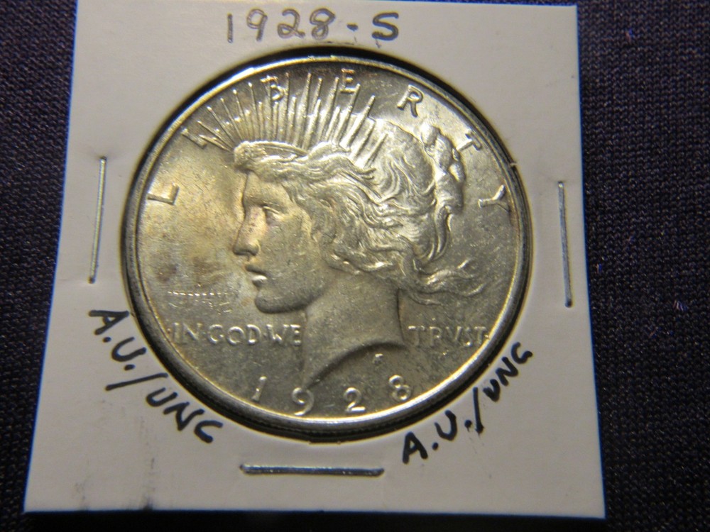1928-S Peace dollar in A.U. / UNC condition