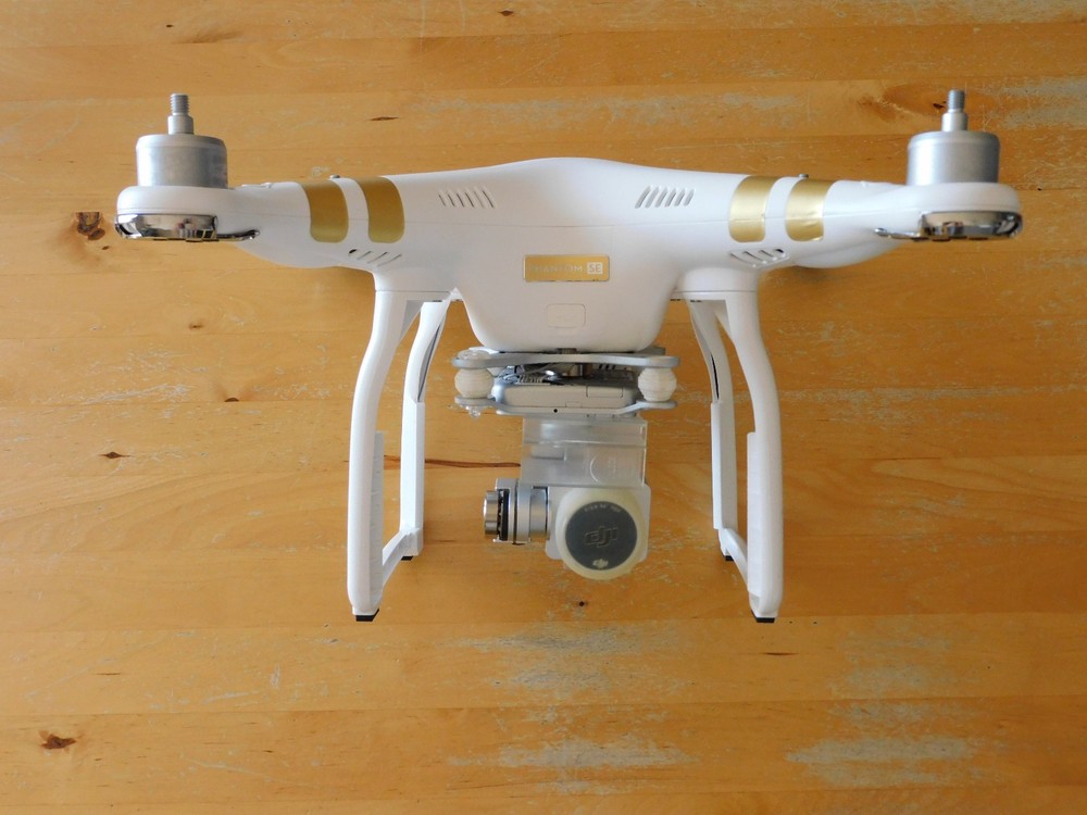 DJI Phantom 3 SE 4K Camera Drone - Ready to Fly, With 2 Batteries, Backpack Case