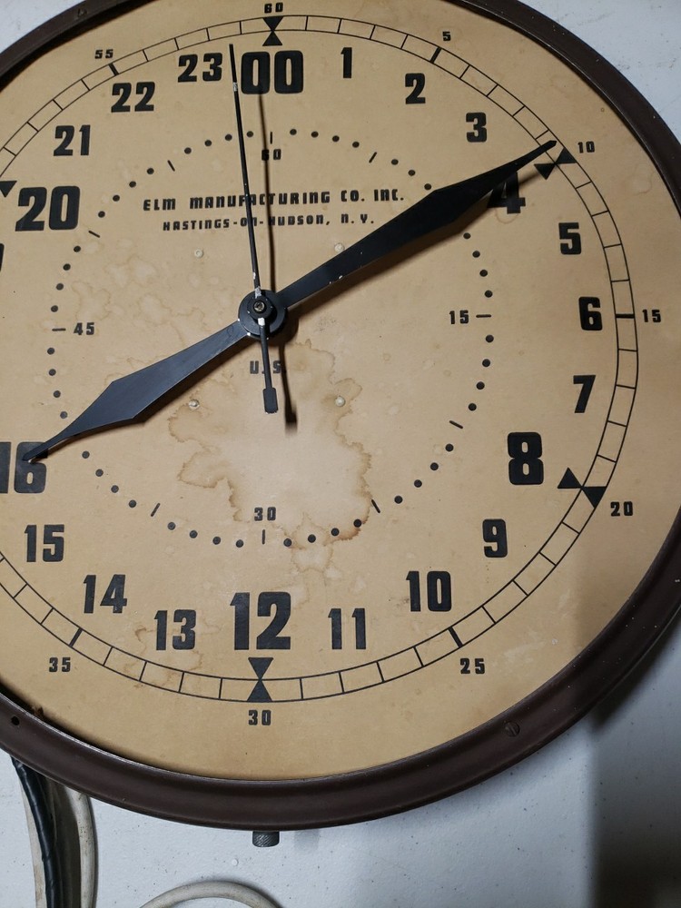 Vintage Elm Manufacturing Co Clock,