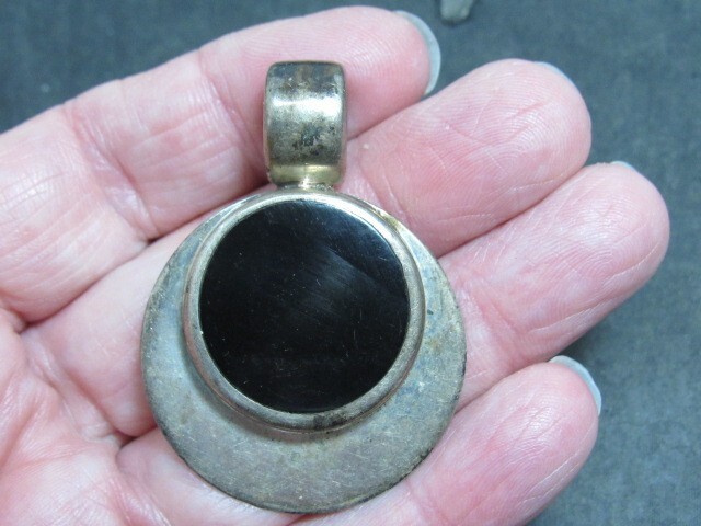 taxco black onyx pendants signed