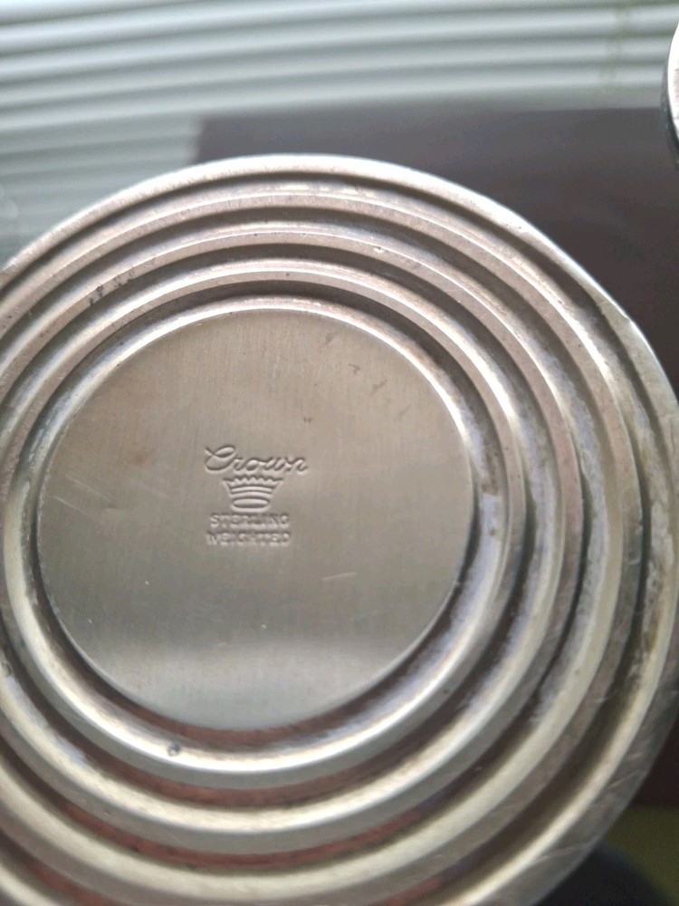 A rare Pair Of Sterling Silver Candelabras By CROWN. 8 In. Tall.