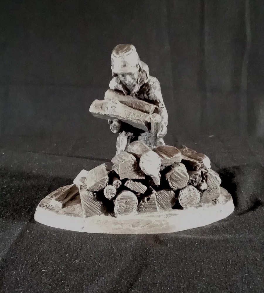 E. Robert Drury 1973 Pewter Figurine 'Boy Stacking Logs'