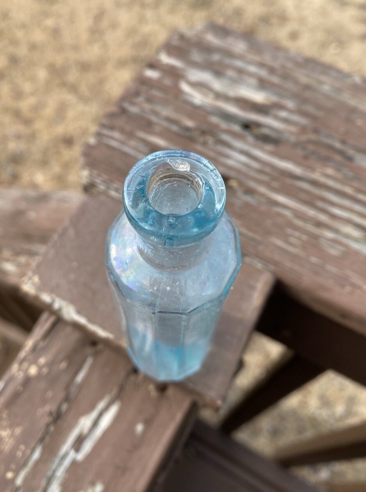 Carbona Products Co 12-sidesd Blown Bottle