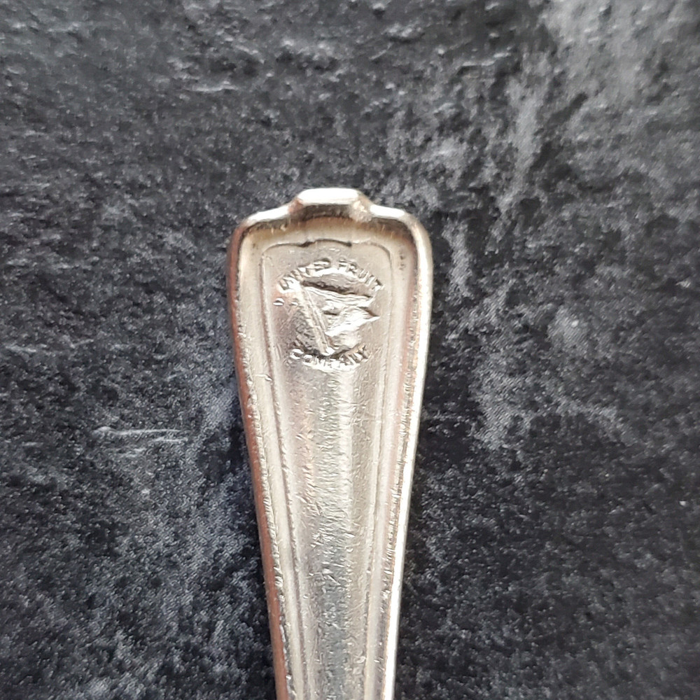 UNITED NUT CO. SILVERPLATE DEMITASSE SPOON-INTERNATIONAL SILVER CO.