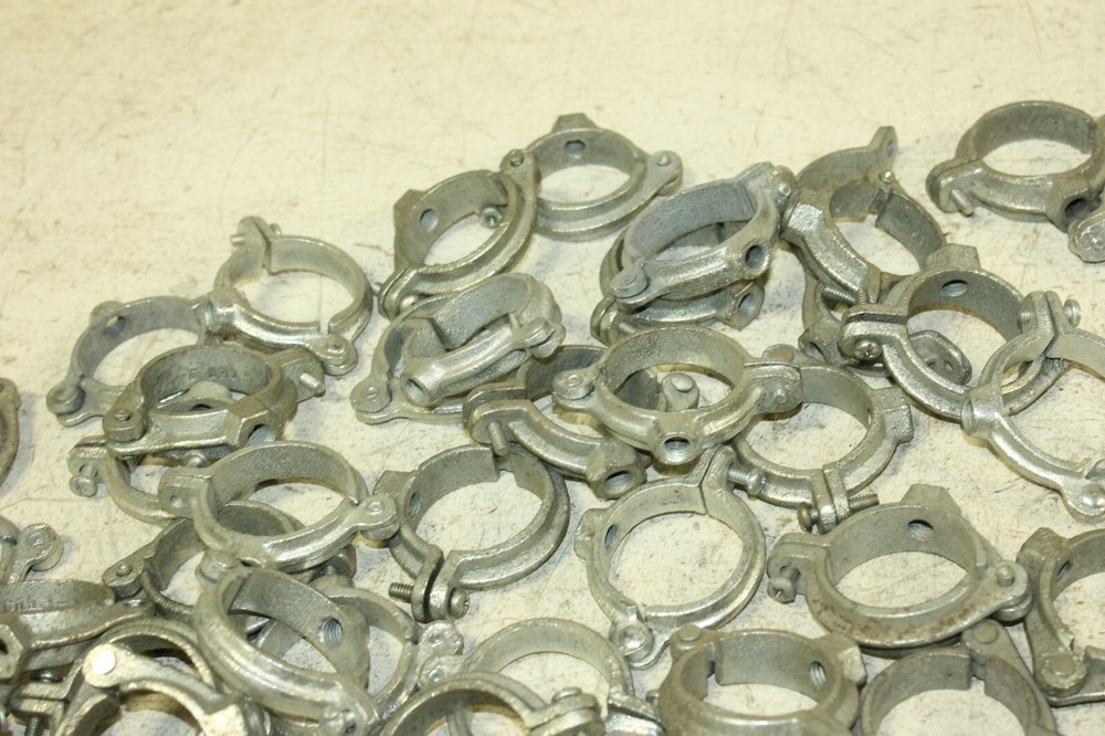 A lot of 1 1/2" Galvanized Split Ring Pipe Hangers