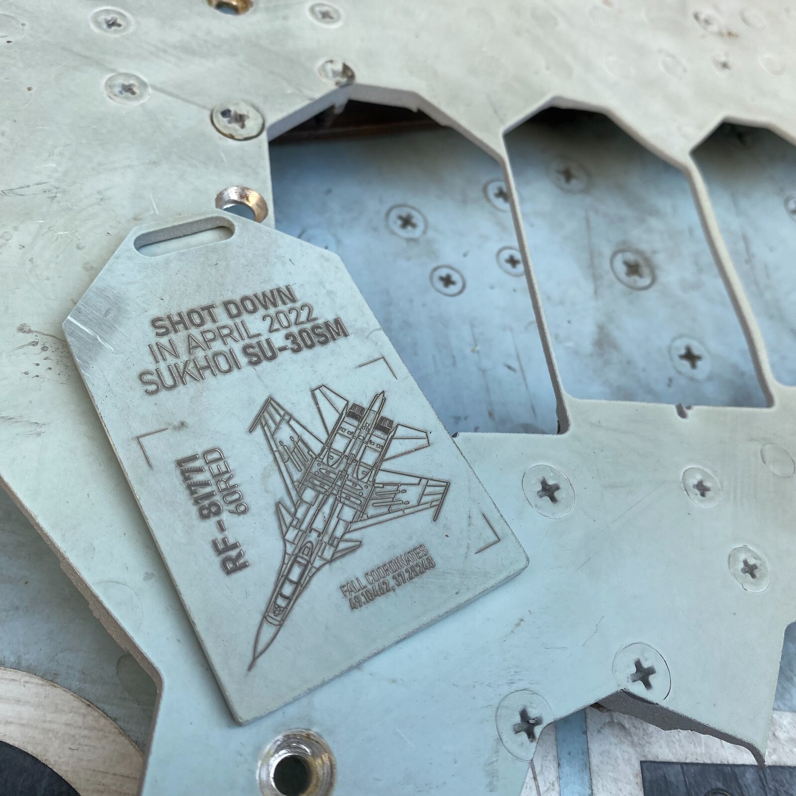 Keychain from the russian Su-30 "60 red" RF-81771  Original aircraft skin tag