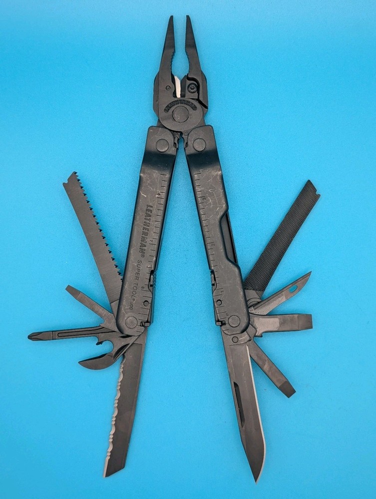 Leatherman Super Tool 300 Multi-tool Pliers! BLACK OXIDE!