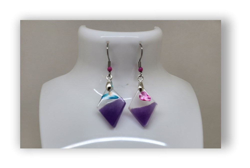 Handmade resin artistic earrings.