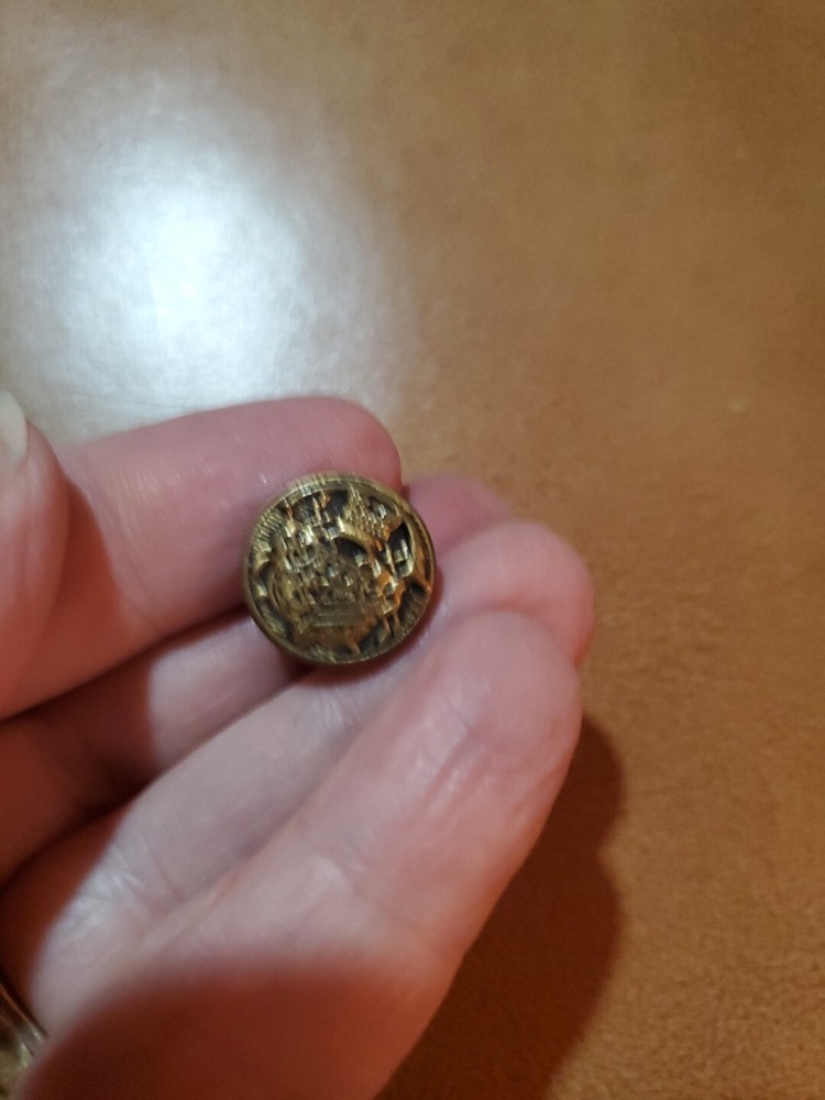 4 miscellaneous antique brass buttons