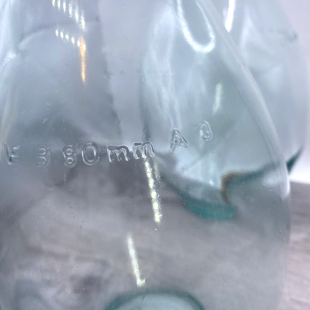 Two old wine bottles - 1 Cork inside - Label Residue