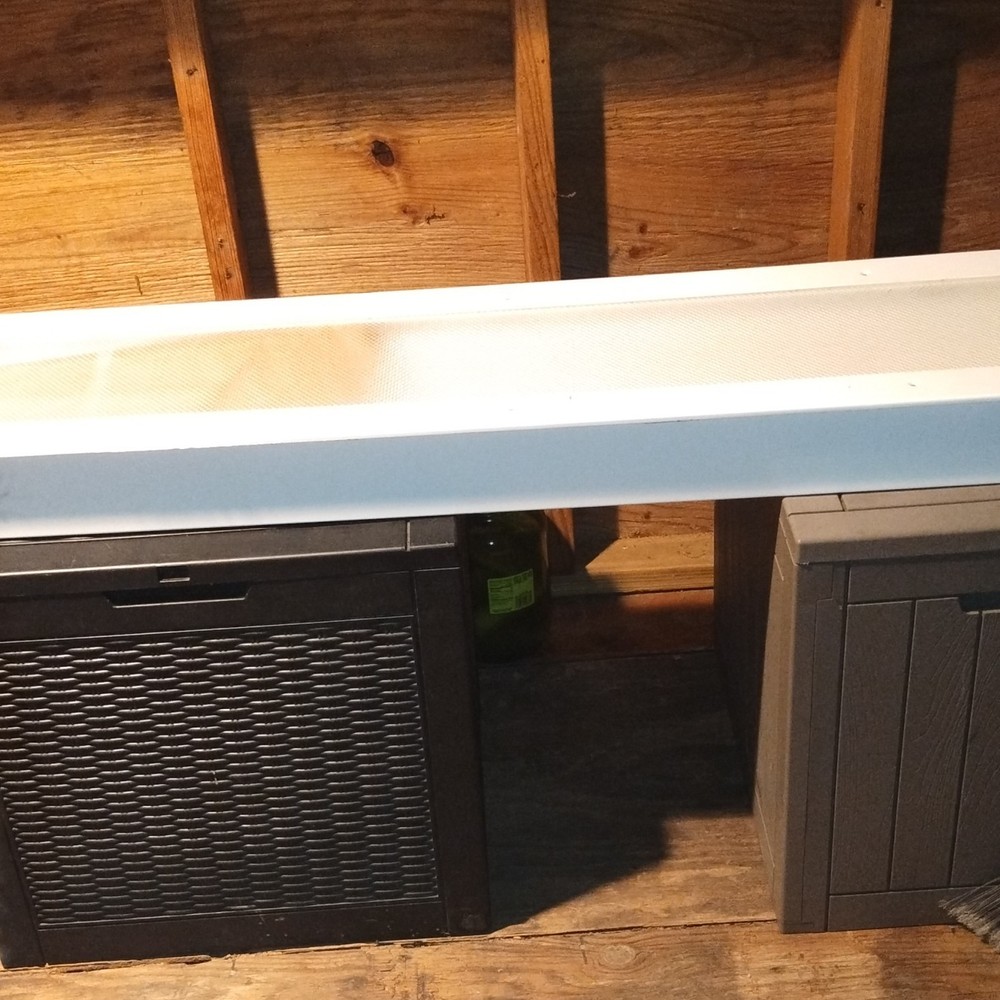 Rectangular Industrial Lighting Fixture with White Metal Grid Mesh Cover