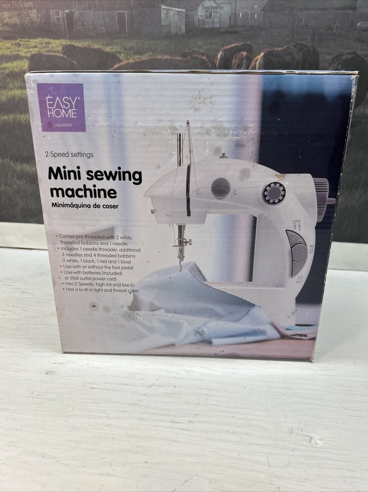 (Z). EASY HOME SOLUTIONS        MINI SEWING MACHINE