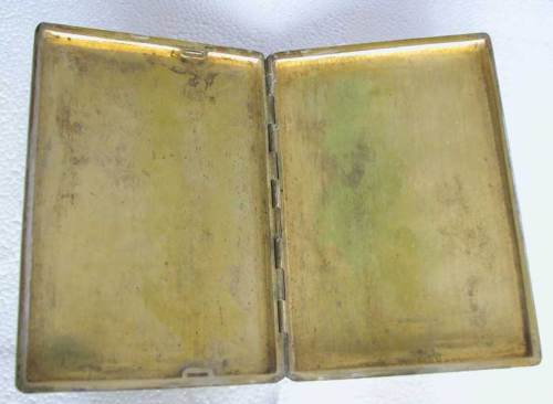 A VINTAGE MIDDLE EASTERN SILVER CIGARETTE CASE