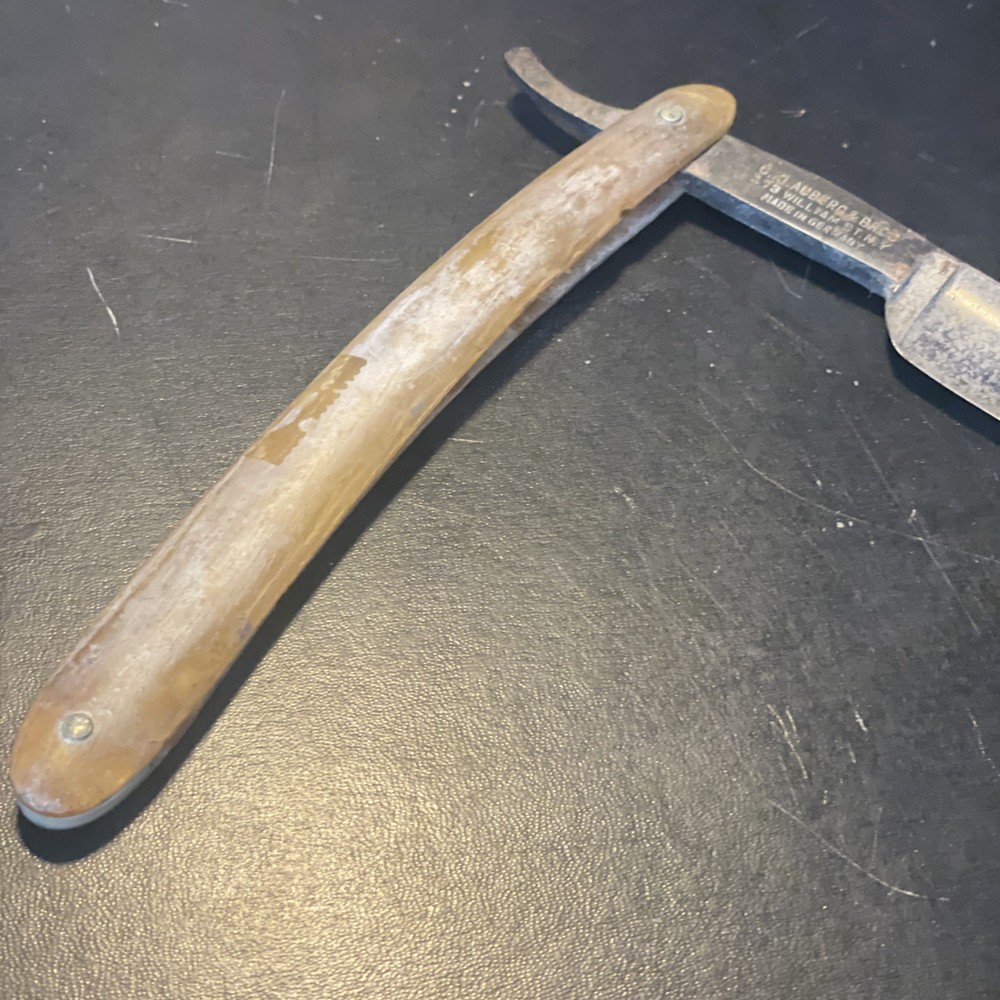 Two vintage straight razors