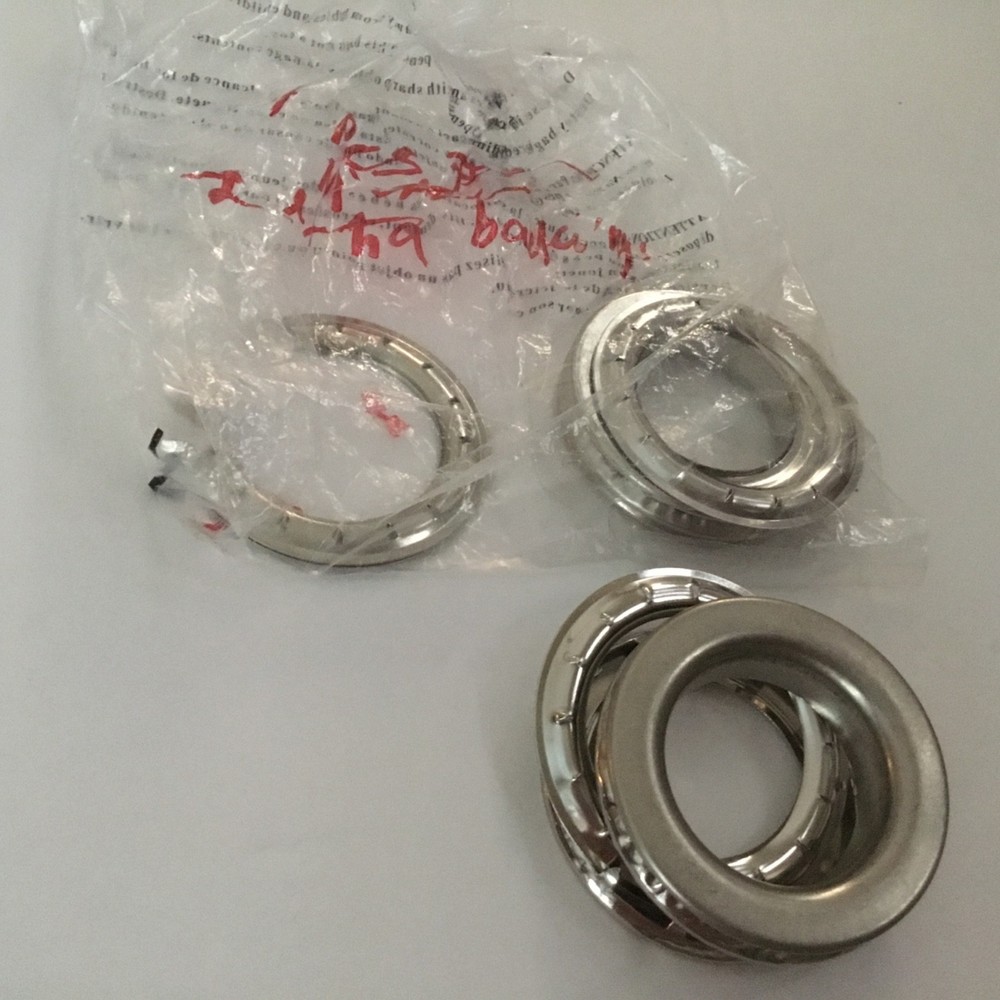 Grommets nickel. size 12. 4 sets