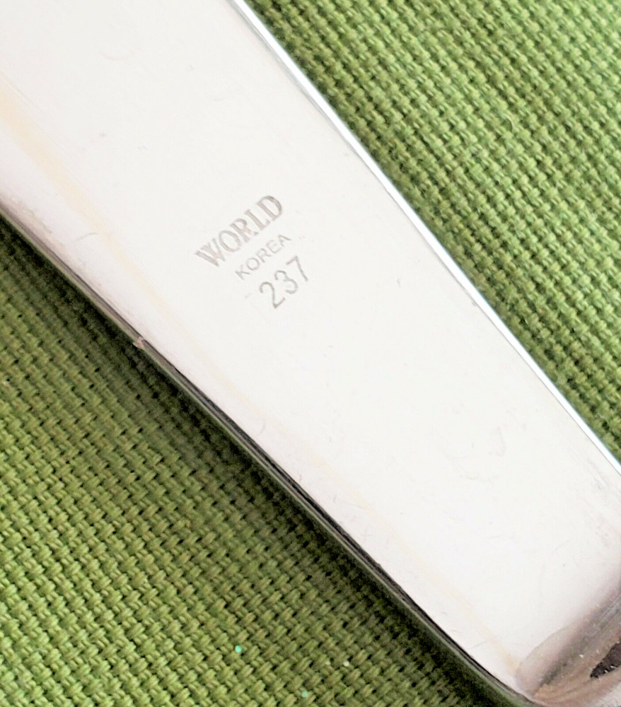 World Stainless Knife Repetition Pattern 9 1/8" Glossy Ridges