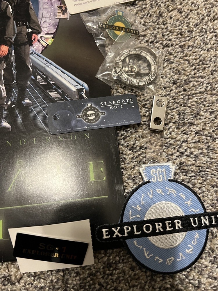 STARGATE SG1 EXPLORER UNIT FIELD PACK Folder Badge Patch Pins ID Video VHS