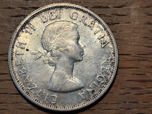 2 Canadian 80% Silver Dollars Both Dated 1963 Some Toning