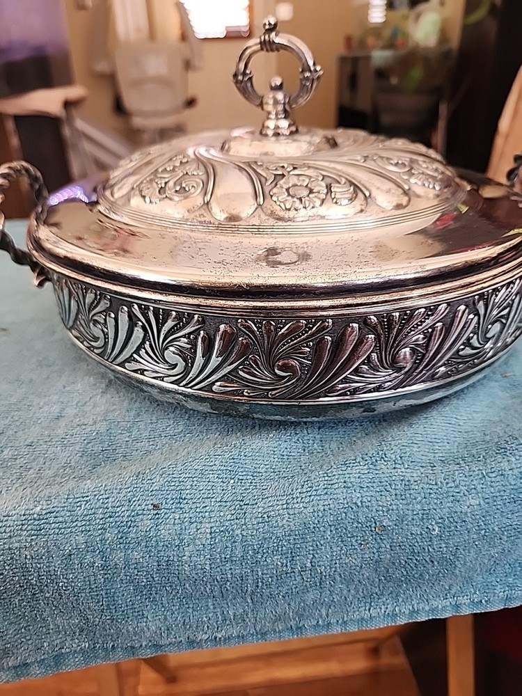 silver plate covered serving dish. James W. Tufts Piece