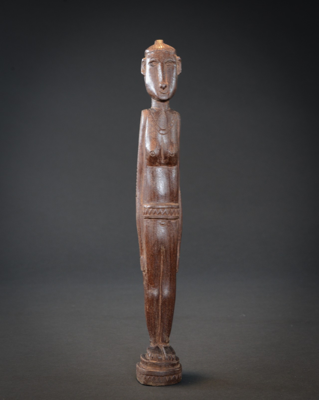 FEMALE ANCESTOR FIGURE, Massim, Papua New Guinea.