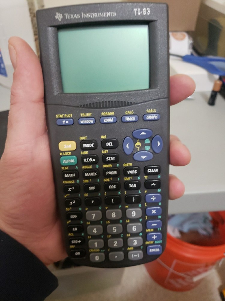 Texas Instruments TI-83 Handheld Graphing Calculator