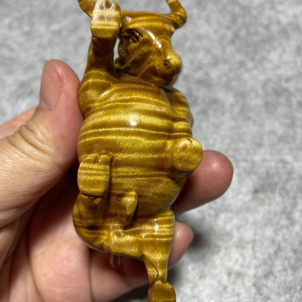 Golden Nanmu Ox Hand Piece Water Wave Grain Carved Decor (Random Color)