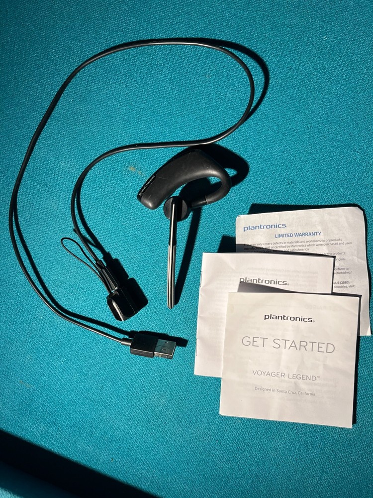 Blue Tooth head set with USB charging/training cord and instructions, working