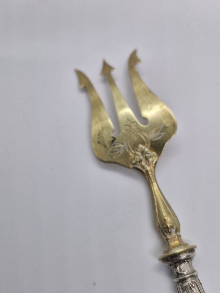 Vintage Antique brass fork with silver handle