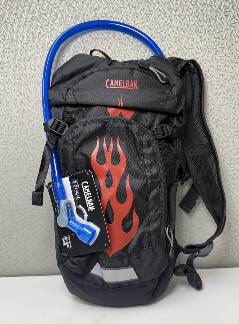 CamelBak Mini M.U.L.E. Kids Hydration Bag 50oz, Black/Flames