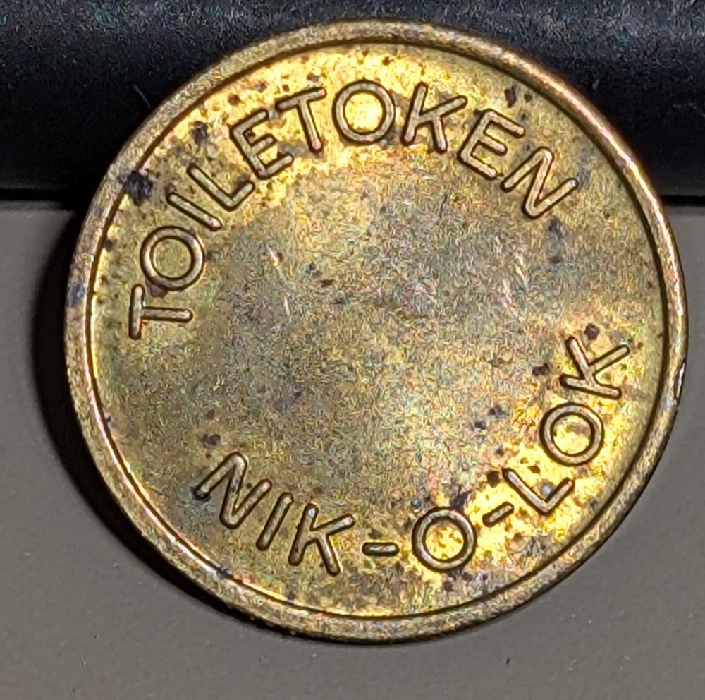 Nik-O-Lock Toiletoken Token Coin 16.65mm