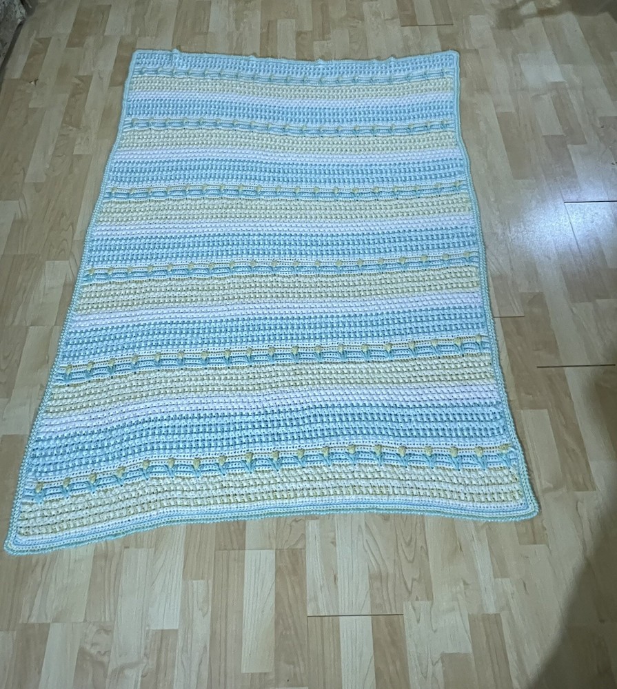 Beautiful crochet blanket pattern is “Spring Breeze” 60” X 53”