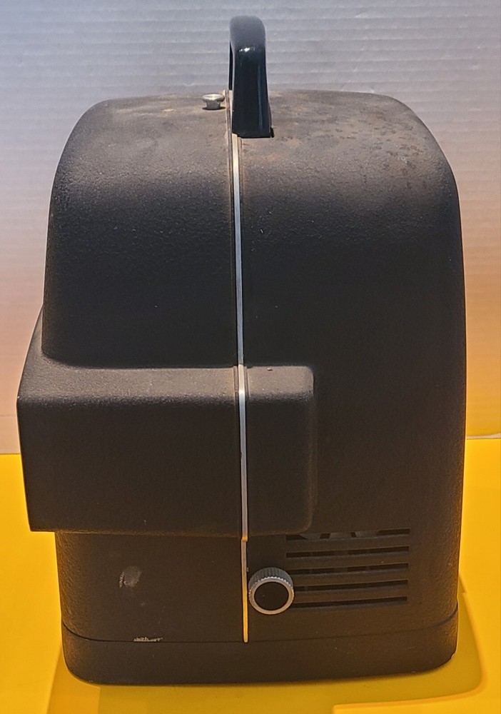 Bell and + Howell- Touch Tronic Lumina 1.2- Automatic Projector- Untested