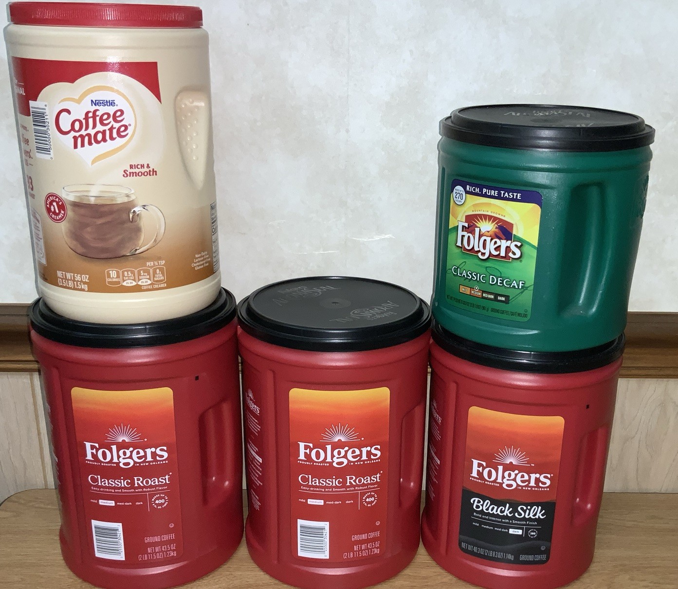Empty Folgers And Coffee Mate Containers