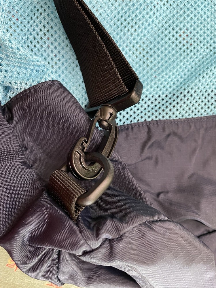 Eddie Bauer navy and teal drawstring bag with backpack straps