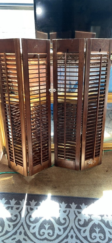 Vintage solid wood framed with hinges and knobs window shutters