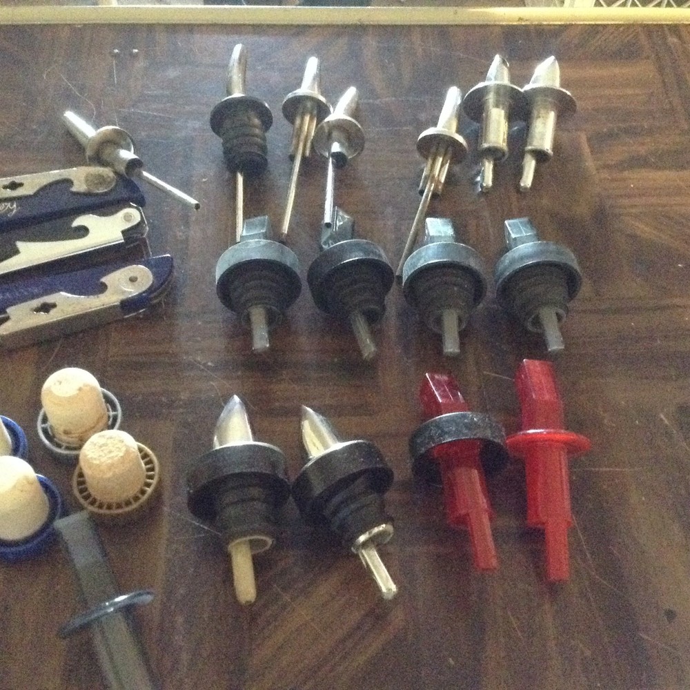 Assorted bar pour spouts, caps and openers