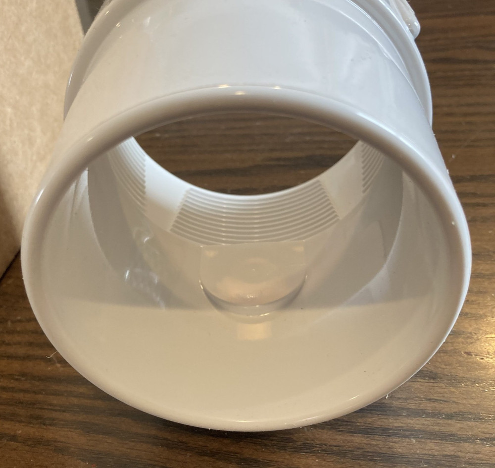 PROFLO PF42840 3" - 4" Adjustable PVC Drain Base with Primer Tap Knockout